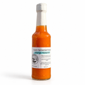 Sauce bottle on white background